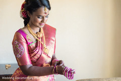 Maharani putting her bangles on Maharani putting her bangles on