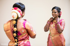 Lovely indian bride checking her bridal look Lovely indian bride checking her bridal look