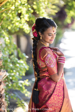 Sweet indian bride posing for the camera indian bride,bridal sari,bridal fashion