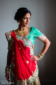 Charming Indian bride posing on her wedding ceremony outfit. Charming Indian bride posing on her wedding ceremony outfit.