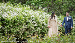 Sweet indian couple walking holding hands indian wedding gallery,outdoor photography,indian bride and groom