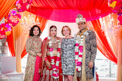 Graceful Indian bride and groom with friends portrait. Graceful Indian bride and groom with friends portrait.