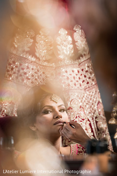 Lovely bride getting her makeup done Lovely bride getting her makeup done