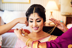 Sweet Indian bride being help to get ready. Sweet Indian bride being help to get ready.