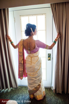 Adorable Indian bride looking out the window. Adorable Indian bride looking out the window.