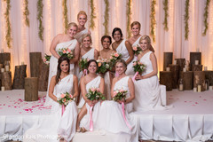 Joyful Indian bride with bridesmaids capture. indian bride,indian wedding reception fashion,indian bridesmaids