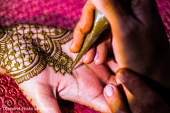 Mehndi artist at work Mehndi artist at work
