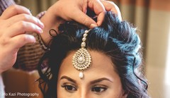 Indian bride getting her Stunning Indian tikka on. Indian bride getting her Stunning Indian tikka on.
