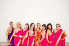 Sweet Indian bride posing with her bridesmaids outdoor capture. Sweet Indian bride posing with her bridesmaids outdoor capture.