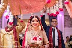 Exited Indian bride entering to wedding ceremony. Exited Indian bride entering to wedding ceremony.