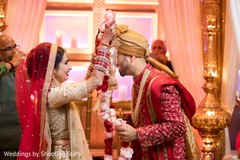 Indian bride and groom exchanging garlands ceremony. Indian bride and groom exchanging garlands ceremony.