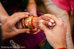 Indian bride's mehndi art and bangles closeup capture. Indian bride's mehndi art and bangles closeup capture.