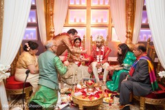 Indian bride and grooms capture at their wedding ceremony ritual. Indian bride and grooms capture at their wedding ceremony ritual.