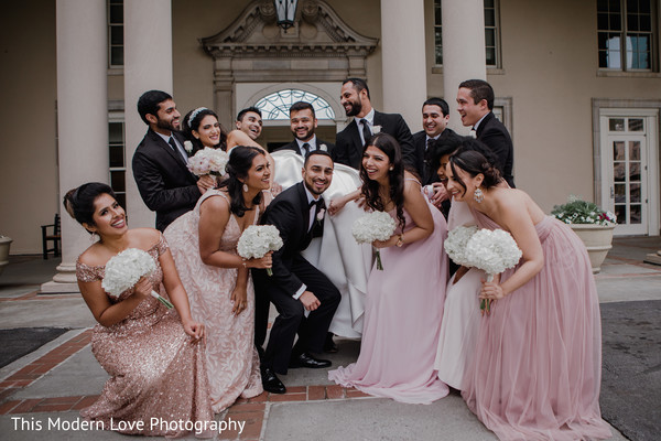 Vibrant capture of indian couple with bridesmaids and groomsmen