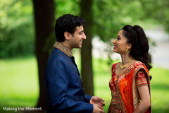 Joyful Indian bride and groom looking at each other. Joyful Indian bride and groom looking at each other.