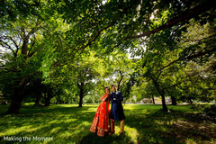 Ravishing Indian bride and groom posing outdoors. Ravishing Indian bride and groom posing outdoors.