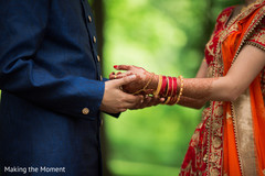 Adorable Indian couple holding hands closeup capture. Adorable Indian couple holding hands closeup capture.