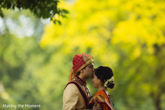 Adorable Indian bride being kissed by groom outdoor capture. Adorable Indian bride being kissed by groom outdoor capture.