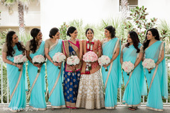 Sweet Indian bride with bridesmaids posing for photo. Sweet Indian bride with bridesmaids posing for photo.