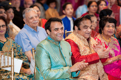 Indian groom and guests having fun at the sangeet celebration. Indian groom and guests having fun at the sangeet celebration.