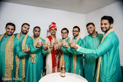 Indian groom toasting with groomsmen Indian groom toasting with groomsmen