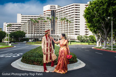 Glamorous Indian bride and groom outdoors portrait. Glamorous Indian bride and groom outdoors portrait.