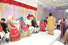 Enchanting Indian groom waiting for bride at wedding ceremony mandap. Enchanting Indian groom waiting for bride at wedding ceremony mandap.