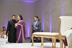 Indian wedding family members giving out a speech capture. Indian wedding family members giving out a speech capture.