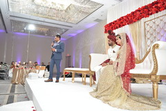 Indian wedding reception speech moment capture. Indian wedding reception speech moment capture.