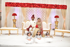 Amazingly Heartfelt Indian bride and groom with flower girls portrait. Amazingly Heartfelt Indian bride and groom with flower girls portrait.
