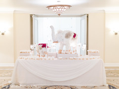 Stunning reception table decoration with flower elephant. Stunning reception table decoration with flower elephant.