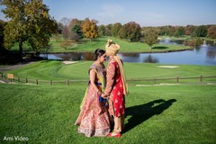 Charming Indian bride and groom holding hands. Charming Indian bride and groom holding hands.