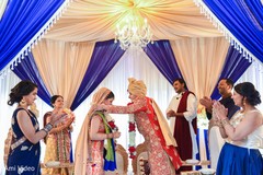 Indian bride and groom exchanging garlands ceremony. Indian bride and groom exchanging garlands ceremony.
