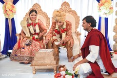 Indian couple making offerings to sacred fire. Indian couple making offerings to sacred fire.