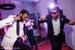 Indian groom's and groomsman dance performance. Indian groom's and groomsman dance performance.