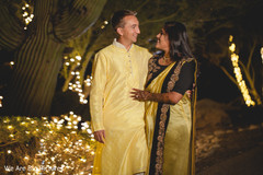 Lovely indian couple in yellow outfits Lovely indian couple in yellow outfits