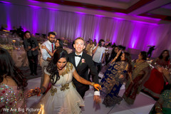 Gorgeous Indian bride and groom rocking the dance floor. Gorgeous Indian bride and groom rocking the dance floor.