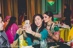 Indian bride posing with friend . Indian bride posing with friend .