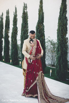 Sweet and lovely Indian bride's and groom's first look scene. Sweet and lovely Indian bride's and groom's first look scene.