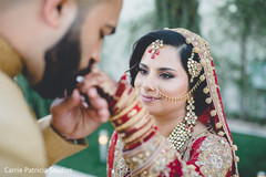 Glamorous Indian bride looking at groom capture. Glamorous Indian bride looking at groom capture.