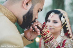 Indian bride and groom's romantic first look moment Indian bride and groom's romantic first look moment