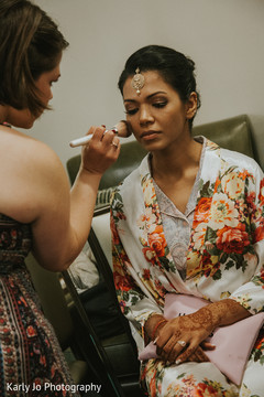 Lovely bride getting her makeup done Lovely bride getting her makeup done