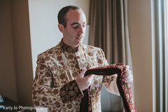 Indian groom getting ready scene Indian groom getting ready scene