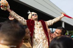 Indian groom with groomsmen during baraat indian pre-wedding celebration,baraat procession,baraat,indian groom
