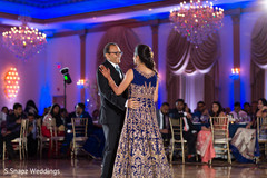 Cute Indian bride dancing with her father. Cute Indian bride dancing with her father.