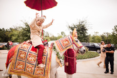 Cheerful Indian groom at baraat outdoors photography. indian pre-wedding celebration,baraat procession,baraat,indian groom