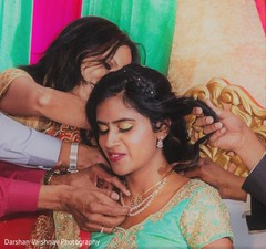 Lovely Indian bride getting a necklace on capture. Lovely Indian bride getting a necklace on capture.