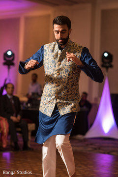 Indian groom's sangeet performance Indian groom's sangeet performance