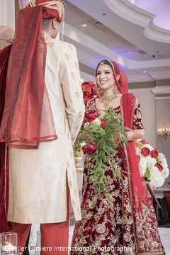 Sweet indian couple at their wedding ceremony. indian wedding ceremony,indian wedding ceremony photography,indian bride and groom