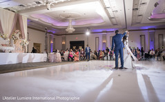 Sweet indian couple having their first dance indian wedding reception,indian wedding reception photography,indian bride and groom